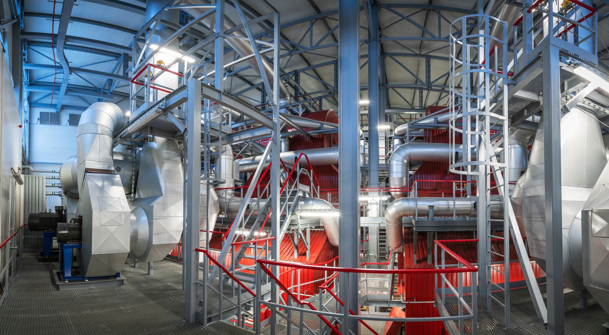 Industrial equipment and piping inside a modern plant